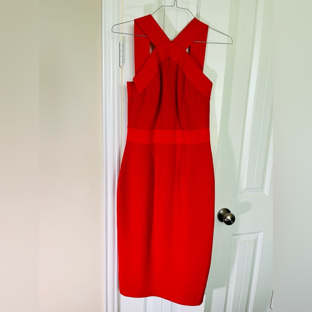 Tangerine New York and Company, fitted, halter dress. In perfect condition!